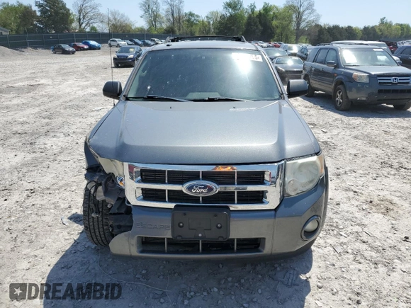 2011 Ford Escape XLT with VIN 1FMCU0D74BKA19310, listed as a Copart auction lot 52360255 with 232,575 mi miles and Salvage Title. Bid and sale history available at carsss.com. Image 5.