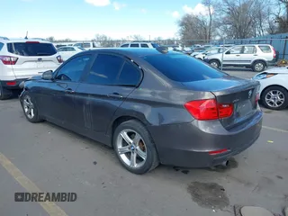 2014 BMW 3 Series 320i xDrive with VIN WBA3C3C58EF983816, listed as a IAAI auction lot 41949430 with 111,627 mi miles. Bid and sale history available at carsss.com. Image 3.