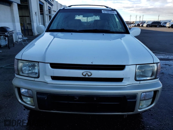 2000 Infiniti QX4 z VIN JNRAR07Y3YW084474, wystawiony jako Copart lot #87089994 z przebiegiem 237 974 mil mil oraz Szkody całkowita. Historia ofert i sprzedaży dostępna na DreamBid. Obrazek 5.