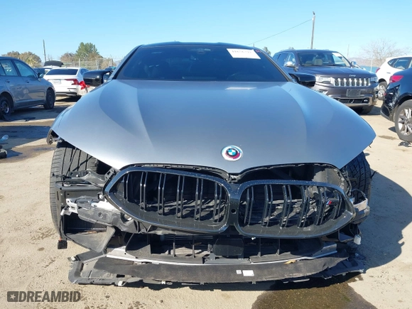 2023 BMW M8 Competition with VIN WBSAE0C0XPCM48877, listed as a IAAI auction lot 41676318 with 18,572 mi miles. Bid and sale history available at carsss.com. Image 13.
