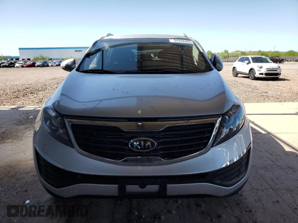 2011 Kia Sportage LX with VIN KNDPB3A2XB7087961, listed as a Copart auction lot 64266405 with 97,094 mi miles and Salvage title. Bid and sale history available at DreamBid. Image 5.