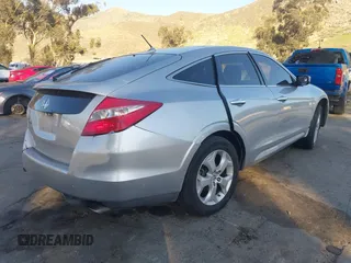 2010 Honda Crosstour EX-L z VIN 5J6TF1H59AL004799, wystawiony jako IAAI lot #41668347 z przebiegiem 214 195 mil mil oraz . Historia ofert i sprzedaży dostępna na DreamBid. Obrazek 4.