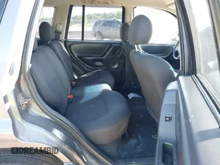 2002 Jeep Grand Cherokee z VIN 1J4GX38S32C238339, wystawiony jako IAAI lot #42653341 z przebiegiem 264 189 mil mil oraz . Historia ofert i sprzedaży dostępna na DreamBid. Obrazek 8.