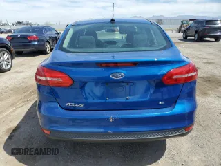 2018 Ford Focus SE z VIN 1FADP3F20JL293119, wystawiony jako Copart lot #58376765 z przebiegiem 38 322 mil mil oraz Szkoda całkowita • Salvage title. Historia ofert i sprzedaży dostępna na DreamBid. Obrazek 6.