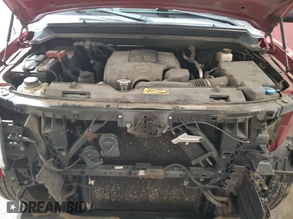 2014 Nissan Titan Pro-4X z VIN 1N6AA0EC6EN501437, wystawiony jako Copart lot #82822234 z przebiegiem 131 112 mil mil oraz Szkoda całkowita • Salvage title. Historia ofert i sprzedaży dostępna na DreamBid. Obrazek 11.