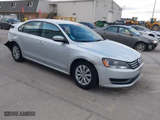 2015 Volkswagen Passat 1.8T Limited Edition with VIN 1VWAT7A31FC043053, listed as a IAAI auction lot 41241394 with 200,687 mi miles. Bid and sale history available at carsss.com. Image 1.