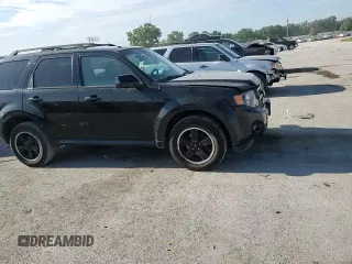 2011 Ford Escape XLT с VIN 1FMCU9DG5BKB65171, выставлен на аукционе Copart как лот 63237785 с пробегом 195 141 миль миль и Списание • Salvage title. История ставок и продаж доступна на DreamBid. Изображение 14.