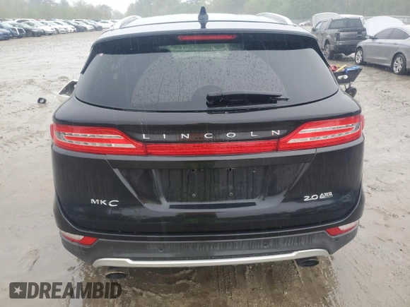 2015 Lincoln MKC with VIN 5LMCJ2A92FUJ22517, listed as a Copart auction lot 55809485 with 185,536 mi miles and Clean Title. Bid and sale history available at DreamBid. Image 6.