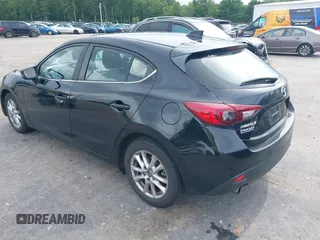2014 Mazda 3 i Touring z VIN JM1BM1L76E1155763, wystawiony jako IAAI lot #42684723 z przebiegiem 84 837 mil mil oraz . Historia ofert i sprzedaży dostępna na DreamBid. Obrazek 3.
