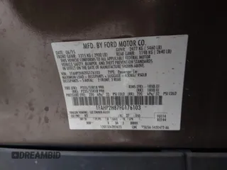 2015 Ford Taurus SEL with VIN 1FAHP2H87FG176103, listed as a IAAI auction lot 41950844 with 205,014 mi miles. Bid and sale history available at carsss.com. Image 9.