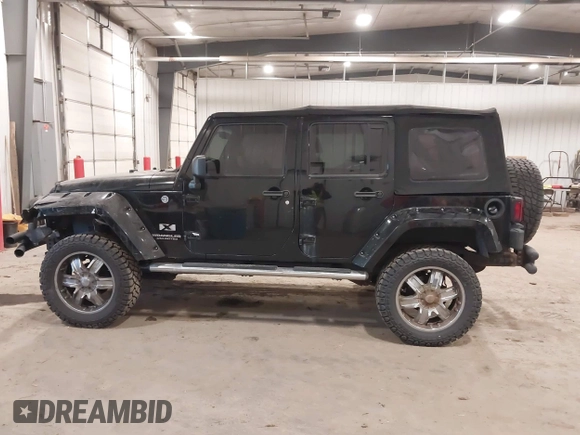 2008 Jeep Wrangler Unlimited X with VIN 1J4GA391X8L558984, listed as a IAAI auction lot 41016498 with 123,308 mi miles. Bid and sale history available at carsss.com. Image 14.
