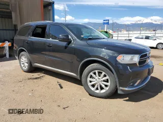 2014 Dodge Durango SXT with VIN 1C4RDJAG1EC972595, listed as a Copart auction lot 57133105 with 126,011 mi miles and Clean title. Bid and sale history available at DreamBid. Image 4.