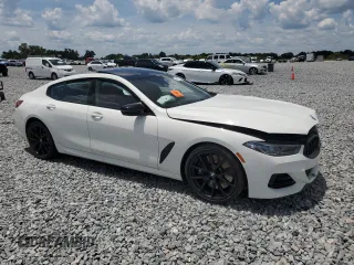 2023 BMW 8 Series M850i with VIN WBAGV8C07PCL57496, listed as a Copart auction lot 64175375 with Not provided miles and Non repairable. Bid and sale history available at DreamBid. Image 4.