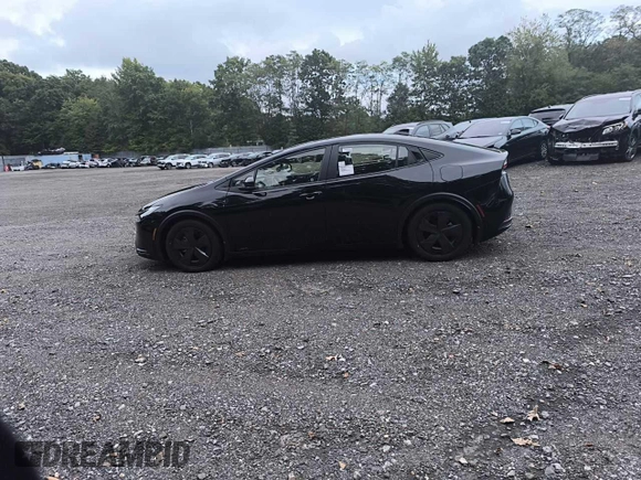 2024 Toyota Prius LE z VIN JTDADABU4R3013862, wystawiony jako Copart lot #74573904 z przebiegiem 6 mil mil oraz Czysty tytuł • Clean title. Historia ofert i sprzedaży dostępna na DreamBid. Obrazek 14.