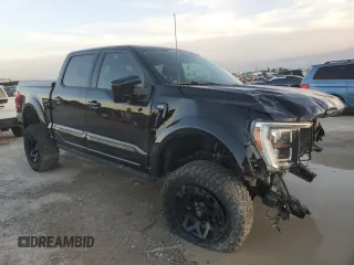 2021 Ford F-150 XL with VIN 1FTFW1E5XMFB70288, listed as a Copart auction lot 87917535 with 35,111 mi miles and Salvage Title. Bid and sale history available at carsss.com. Image 4.