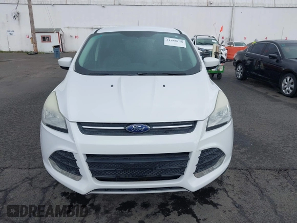 2013 Ford Escape SE with VIN 1FMCU9G93DUA17816, listed as a IAAI auction lot 41688140 with 129,738 mi miles. Bid and sale history available at carsss.com. Image 12.