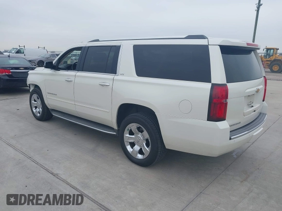 2015 Chevrolet Suburban LTZ with VIN 1GNSCKKC7FR641421, listed as a IAAI auction lot 41637137 with 139,001 mi miles and . Bid and sale history available at DreamBid. Image 3.