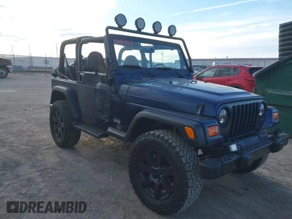 2001 Jeep Wrangler Sport with VIN 1J4FA49S41P334053, listed as a IAAI auction lot 41884967 with 158,258 mi miles. Bid and sale history available at carsss.com. Image 1.