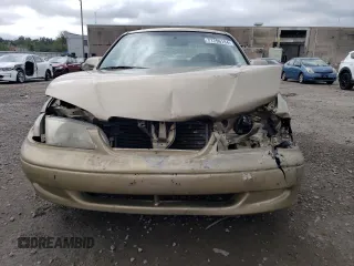 1998 Mazda 626 DX with VIN 1YVGF22CXW5733338, listed as a Copart auction lot 71796184 with 196,218 mi miles and Salvage Title. Bid and sale history available at carsss.com. Image 5.