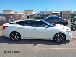 2017 Nissan Maxima SV z VIN 1N4AA6AP8HC446350, wystawiony jako IAAI lot #41852394 z przebiegiem 66 518 mil mil oraz . Historia ofert i sprzedaży dostępna na DreamBid. Obrazek 13.