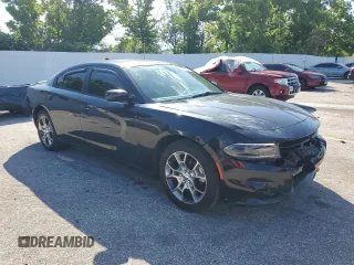2015 Dodge Charger SXT with VIN 2C3CDXJG1FH779181, listed as a Copart auction lot 54367685 with 147,141 mi miles and Salvage title. Bid and sale history available at DreamBid. Image 4.