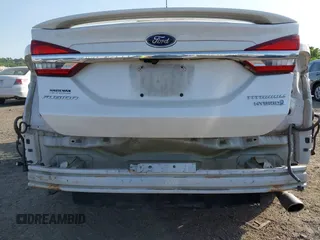 2017 Ford Fusion Hybrid Titanium с VIN 3FA6P0RU7HR148191, выставлен на аукционе IAAI как лот 42167708 с пробегом 72 708 миль миль и . История ставок и продаж доступна на DreamBid. Изображение 18.