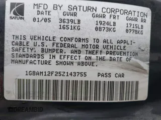 2005 Saturn ION with VIN 1G8AM12F25Z143755, listed as a IAAI auction lot 41858875 with 336,137 mi miles. Bid and sale history available at carsss.com. Image 9.