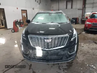 2021 Cadillac XT5 FWD Premium Luxury with VIN 1GYKNCRS3MZ198651, listed as a IAAI auction lot 41607734 with 49,275 mi miles. Bid and sale history available at carsss.com. Image 12.