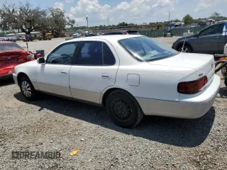 1995 Toyota Camry LE with VIN 4T1SK12E4SU878765, listed as a Copart auction lot 57761385 with 181,674 mi miles and Clean title. Bid and sale history available at DreamBid. Image 2.