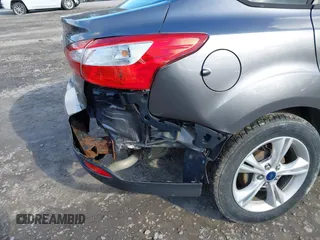 2014 Ford Focus SE with VIN 1FADP3F28EL424707, listed as a IAAI auction lot 42002883 with 115,746 mi miles. Bid and sale history available at carsss.com. Image 6.