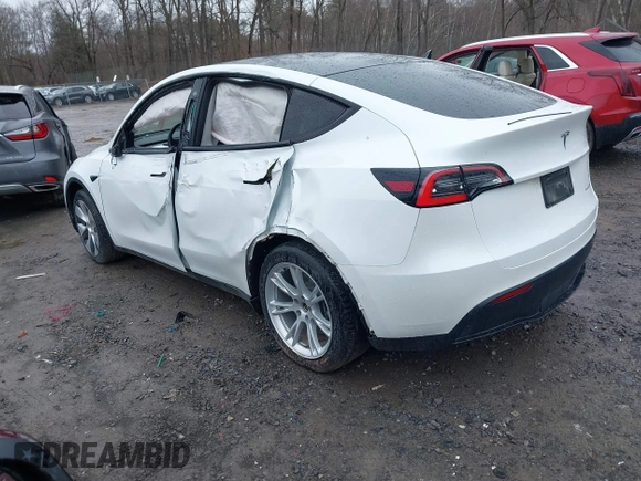 2020 Tesla Model Y Long Range with VIN 5YJYGDEE4LF044843, listed as a IAAI auction lot 41799504 with 40,770 mi miles and . Bid and sale history available at DreamBid. Image 3.