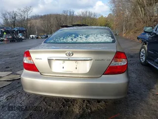 2003 Toyota Camry LE with VIN 4T1BE30K13U705105, listed as a IAAI auction lot 41696395 with 191,389 mi miles and . Bid and sale history available at DreamBid. Image 16.