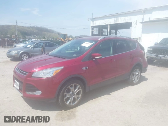 2015 Ford Escape Titanium with VIN 1FMCU9JX9FUB87463, listed as a IAAI auction lot 42059618 with 32,100 mi miles. Bid and sale history available at carsss.com. Image 2.
