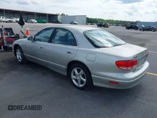 2002 Mazda Millenia with VIN JM1TA221721722364, listed as a IAAI auction lot 42160683 with 166,778 mi miles and . Bid and sale history available at DreamBid. Image 3.