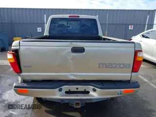 2002 Mazda B-Series 2WD Truck DS with VIN 4F4YR16U52TM18118, listed as a IAAI auction lot 41563022 with 126,136 mi miles. Bid and sale history available at carsss.com. Image 16.