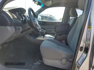 2014 Toyota Tacoma PreRunner with VIN 5TFTX4GN6EX028255, listed as a Copart auction lot 62890915 with 306,908 mi miles and Salvage title. Bid and sale history available at DreamBid. Image 7.