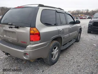 2002 GMC Envoy SLT with VIN 1GKDT13S222241632, listed as a IAAI auction lot 41361598 with 275,343 mi miles. Bid and sale history available at carsss.com. Image 4.