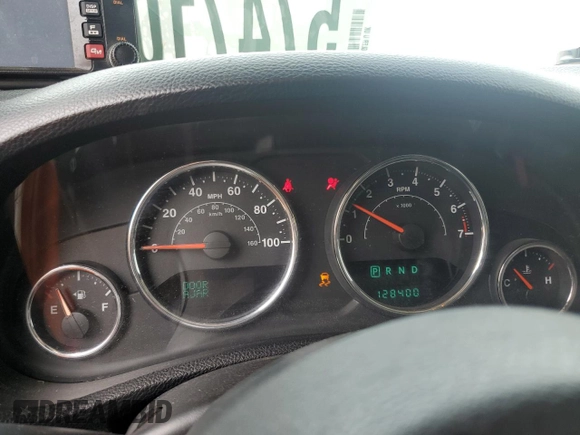 2013 Jeep Wrangler Unlimited Rubicon with VIN 1C4BJWFG5DL661282, listed as a Copart auction lot 57471035 with 128,400 mi miles and Salvage title. Bid and sale history available at DreamBid. Image 9.