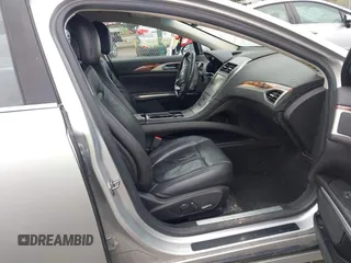 2013 Lincoln MKZ с VIN 3LN6L2GK0DR823324, выставлен на аукционе IAAI как лот 41954237 с пробегом 135 077 миль миль и . История ставок и продаж доступна на DreamBid. Изображение 5.
