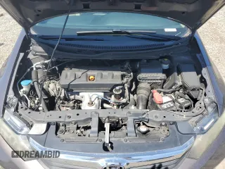 2012 Honda Civic LX z VIN 2HGFB2F5XCH517276, wystawiony jako Copart lot #59443775 z przebiegiem 98 749 mil mil oraz Szkoda całkowita • Salvage title. Historia ofert i sprzedaży dostępna na DreamBid. Obrazek 11.