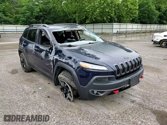 2015 Jeep Cherokee Trailhawk with VIN 1C4PJMBB8FW740452, listed as a Copart auction lot 63023715 with 96,236 mi miles and Salvage title. Bid and sale history available at DreamBid. Image 14.