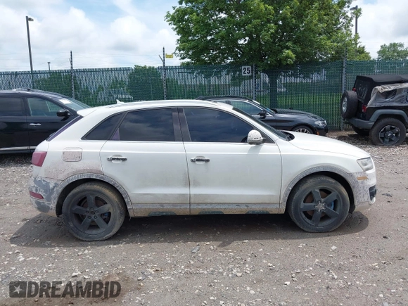 2015 Audi Q3 Premium Plus z VIN WA1EFCFS8FR001278, wystawiony jako IAAI lot #42475043 z przebiegiem 125 417 mil mil oraz . Historia ofert i sprzedaży dostępna na DreamBid. Obrazek 14.