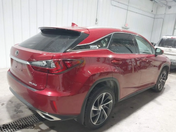 2017 Lexus RX with VIN 2T2BZMCA6HC112857, listed as a IAAI auction lot 41614059 with 100857 miles. Bid and sale history available at carsss.com. Image 4.