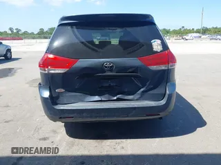 2014 Toyota Sienna L with VIN 5TDZK3DC2ES493997, listed as a IAAI auction lot 41996586 with 192,297 mi miles. Bid and sale history available at carsss.com. Image 16.