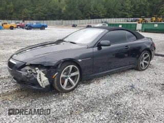 2009 BMW 6 Series 650i with VIN WBAEB53529C224402, listed as a Copart auction lot 73476784 with 140,595 mi miles and Salvage Title. Bid and sale history available at carsss.com. Image 1.