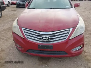2013 Hyundai Azera with VIN KMHFG4JG0DA222882, listed as a IAAI auction lot 41869825 with 170,566 mi miles and . Bid and sale history available at DreamBid. Image 6.