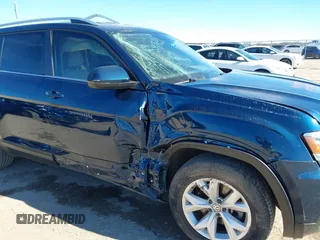 2019 Volkswagen Atlas SE with VIN 1V2DR2CA9KC506188, listed as a IAAI auction lot 41221389 with 67,593 mi miles and . Bid and sale history available at DreamBid. Image 6.