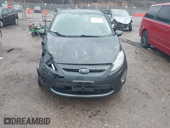 2011 Ford Fiesta SES with VIN 3FADP4FJ7BM111381, listed as a IAAI auction lot 41226251 with 93,694 mi miles. Bid and sale history available at carsss.com. Image 11.