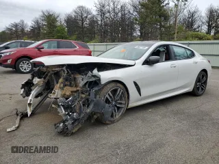 2022 BMW 8 Series M850i z VIN WBAGV8C08NCJ78641, wystawiony jako Copart lot #56027105 z przebiegiem Nie podano mil oraz Szkoda całkowita • Salvage title. Historia ofert i sprzedaży dostępna na DreamBid. Obrazek 1.