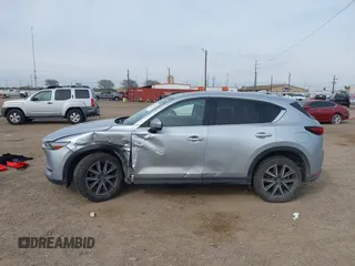 2017 Mazda CX-5 Grand Touring with VIN JM3KFBDL8H0227348, listed as a IAAI auction lot 41572377 with 124,908 mi miles. Bid and sale history available at carsss.com. Image 14.